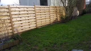 Réalisation d'une palissade en bois.